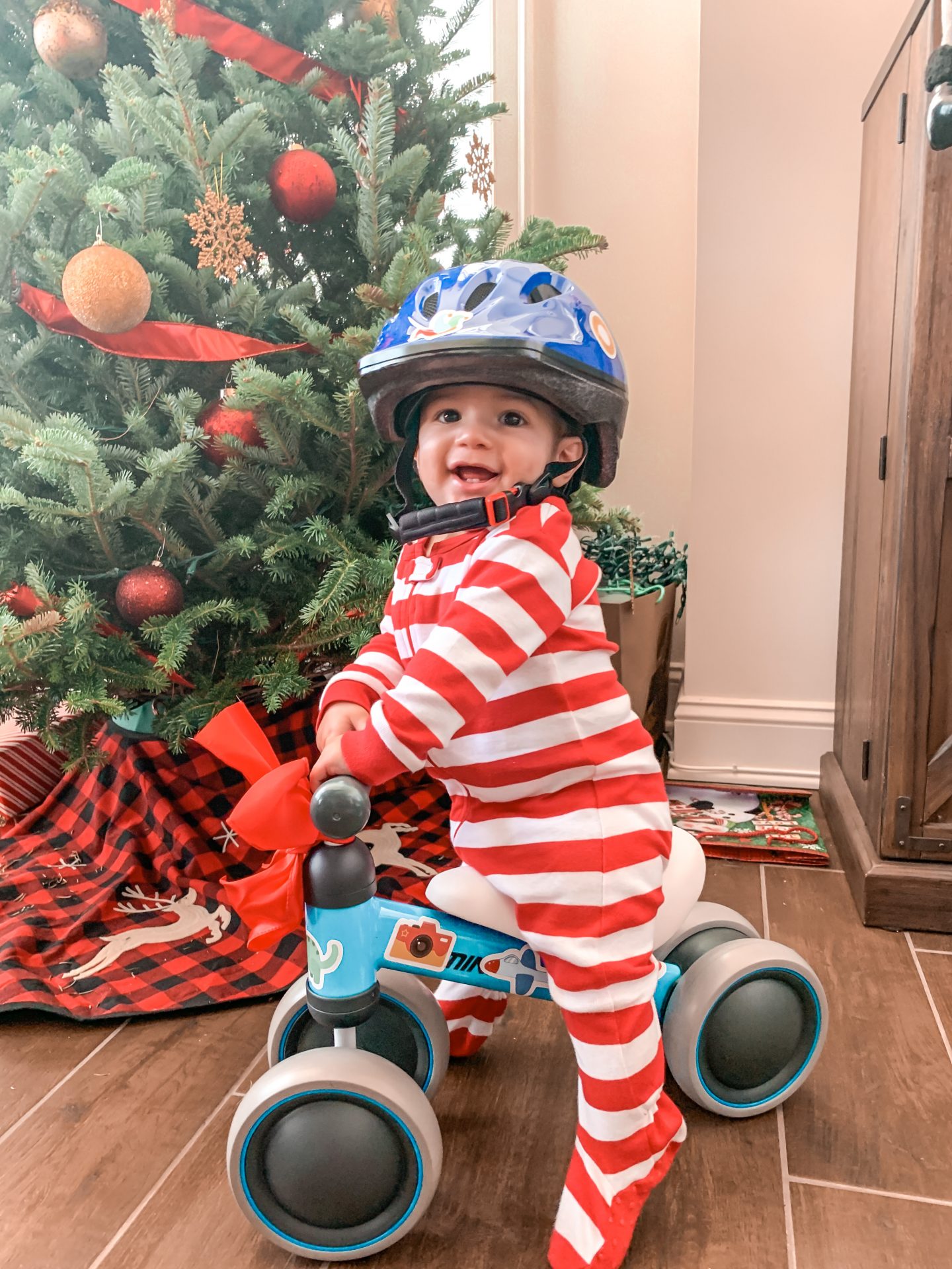 Sebastian with his new balance bike on Christmas, 2019 - 6 months old | Baby must have items | Kat Viana