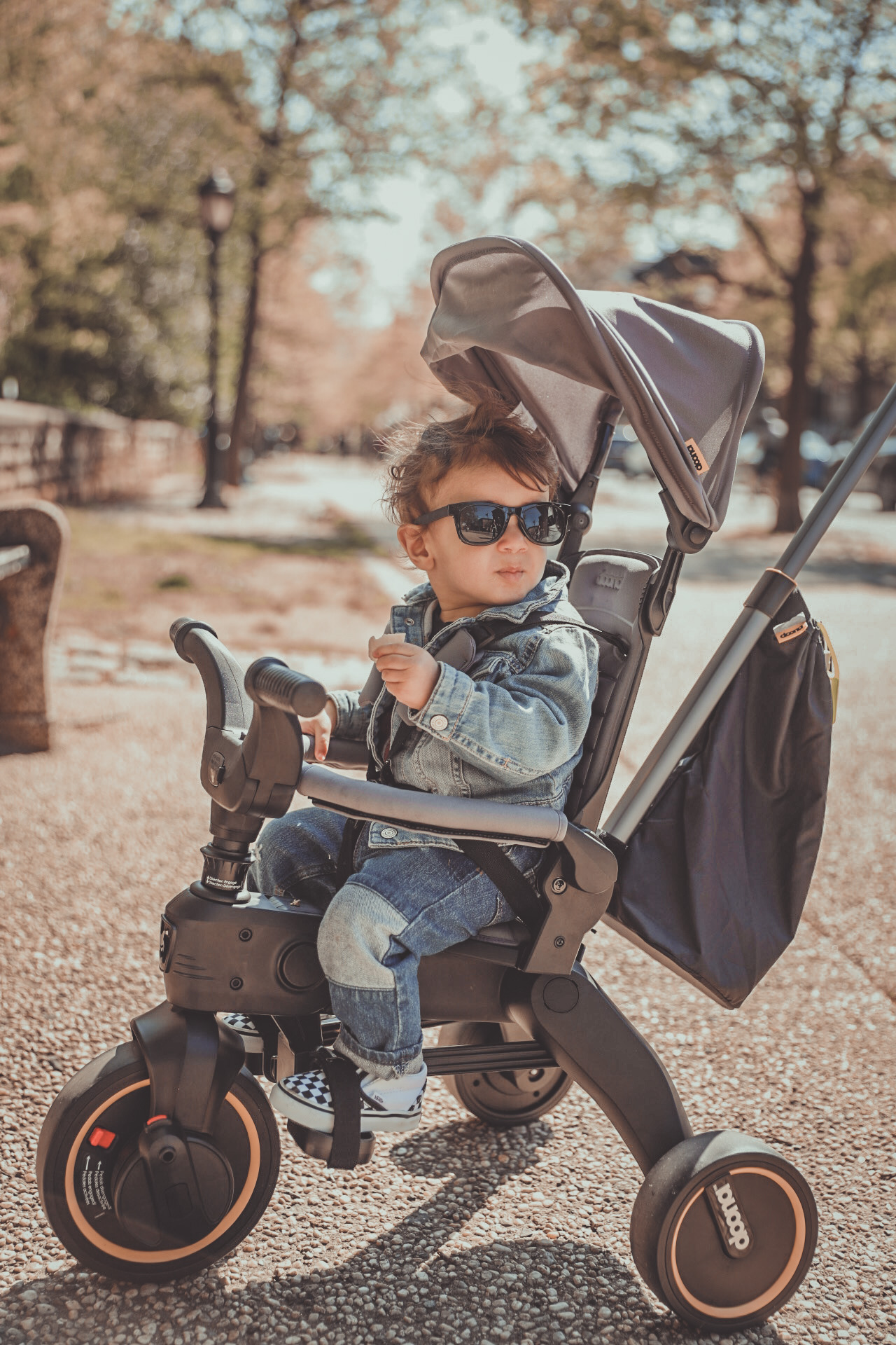 Sebastian Riding his Doona at Prosepct Park, BK. Photo by @carlosabreuphoto | Baby must have items | Kat Viana